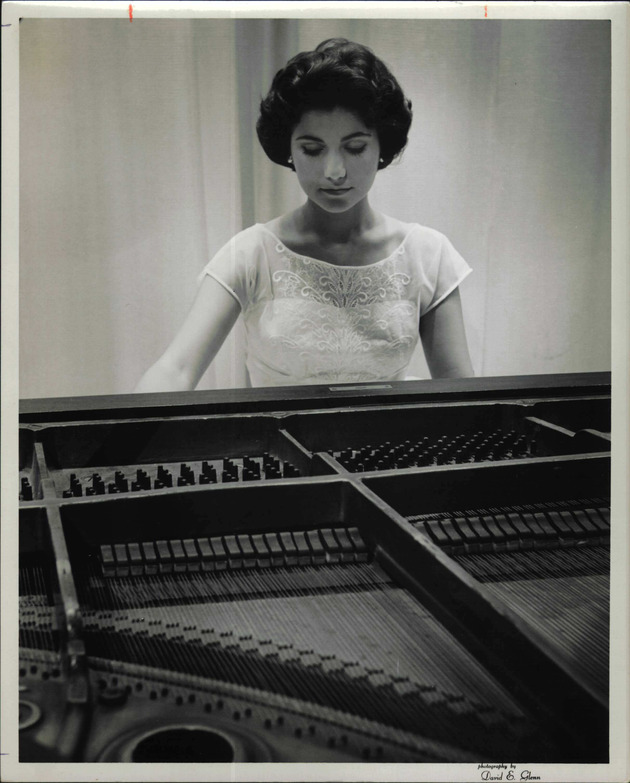Carol DeMarco playing piano